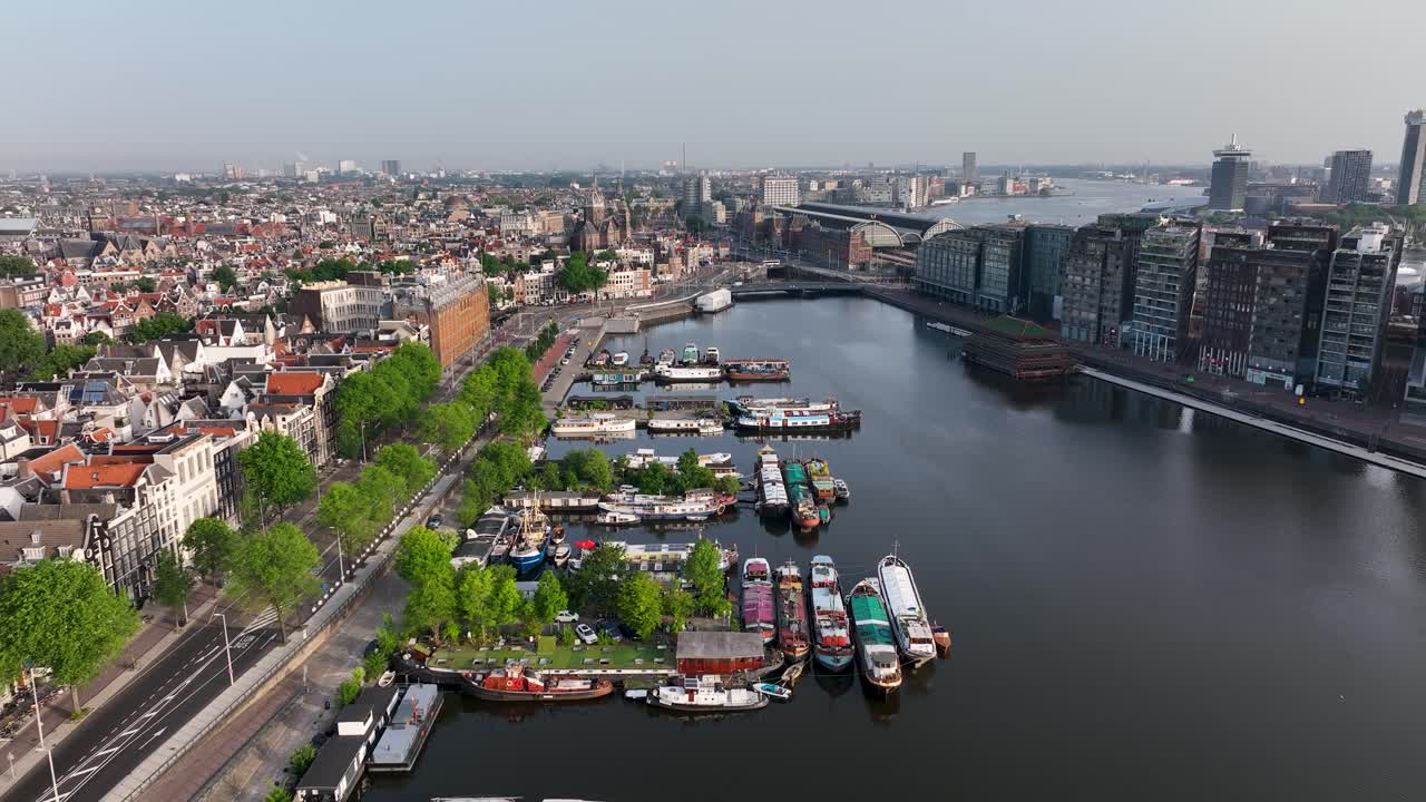Amsterdam cityscape with canals and houseboats