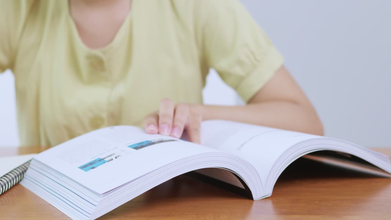 A student engages with study materials a focused home office setting emphasizing learning and productivity