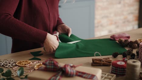 Blonde-woman-making-Christmas-decorations