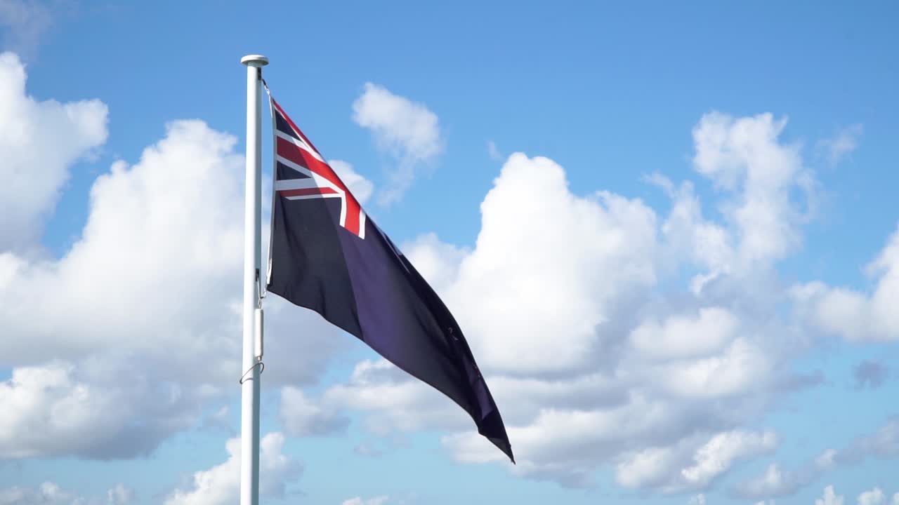 SLOWMO - National New Zealand flag fluttering in wind