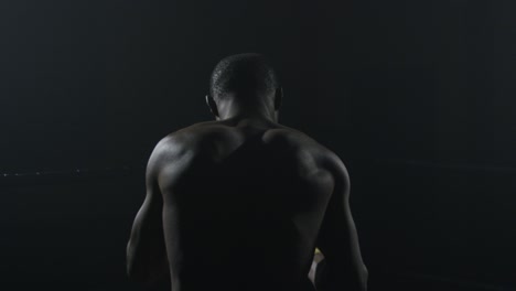 back of boxer in boxing ring