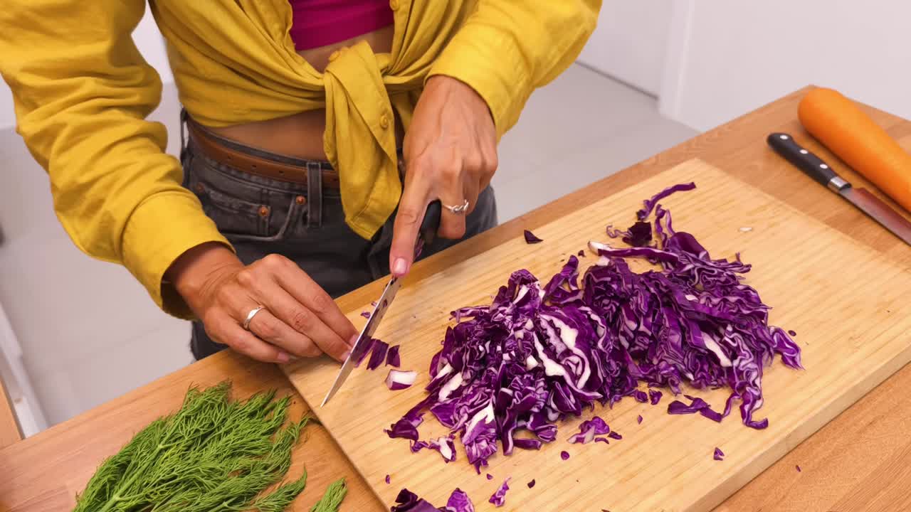 Woman Chopping Red Cabbage