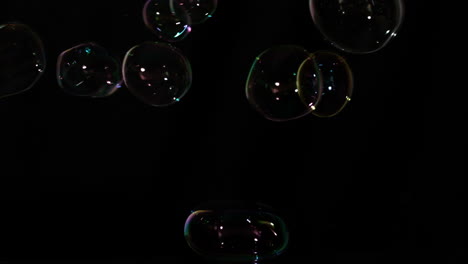 Bubbles-floating-on-black-background