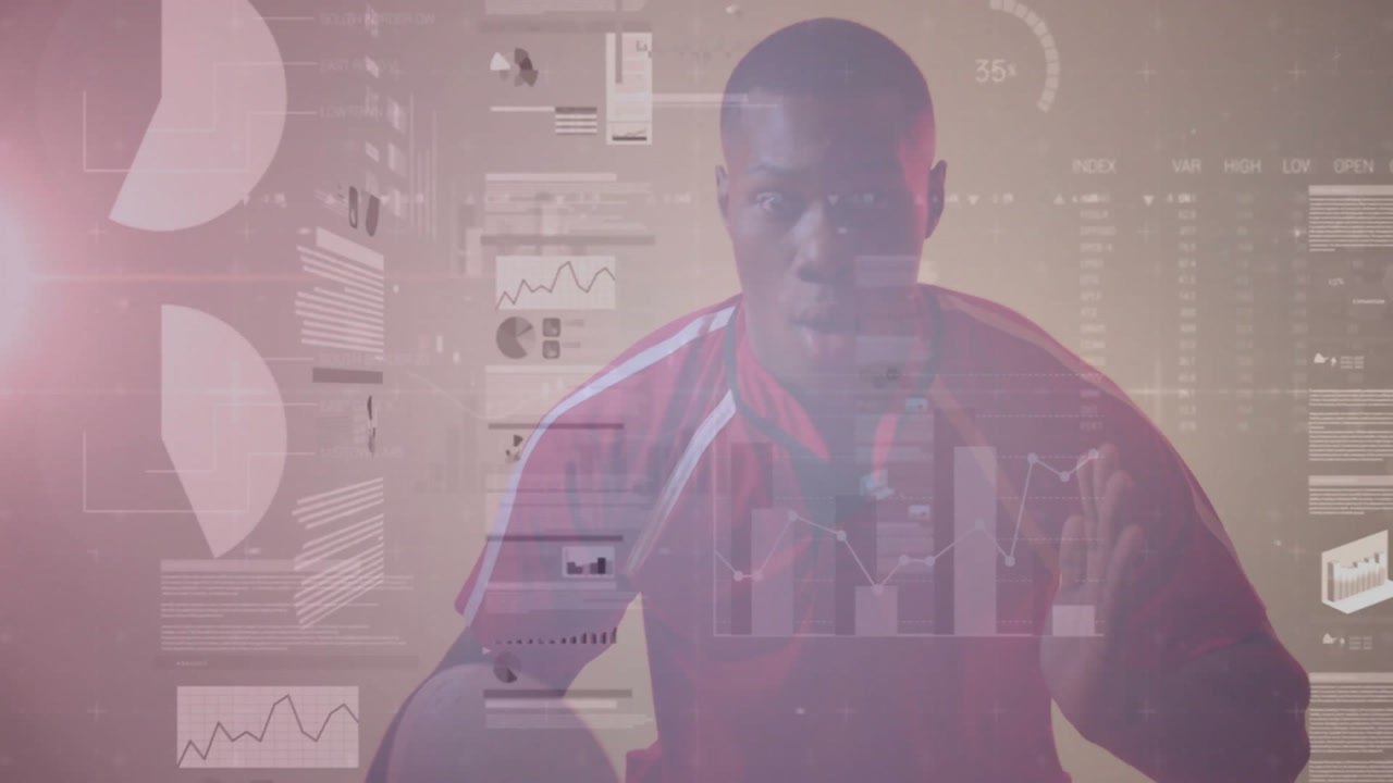 male athlete entering studio holding soccer ball, dribbling, showcasing tech charts pulsing around