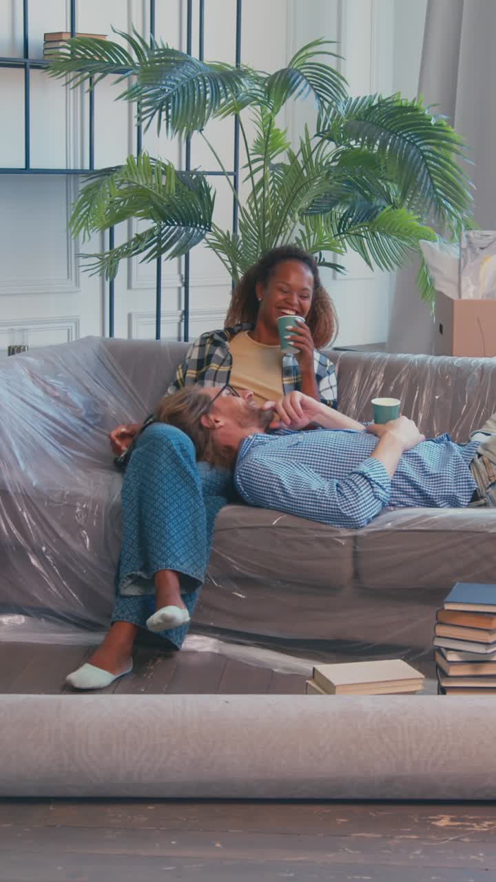 Moving day relaxation after unpacking in a new house