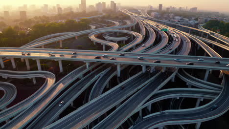 aerial view of a complex highway interchange at golden hour