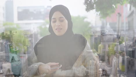 Animación-De-Una-Mujer-Asiática-Con-Hijab-Usando-Un-Teléfono-Inteligente-Sobre-El-Paisaje-Urbano