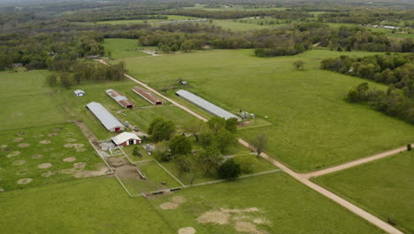 farmhouse on agricultural farm land in arkansas - southern state in us, aerial