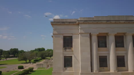 aerial drone shot of white house in the beautiful sky