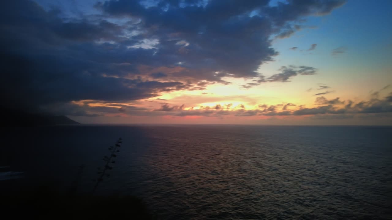 Panoramic aerial view of Choroni Bay with its mountains at sunset, with clouds, Aragua, Venezuela