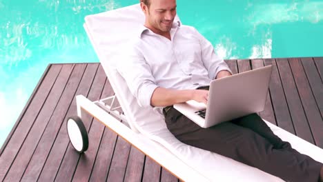 Man-using-laptop-in-the-garden