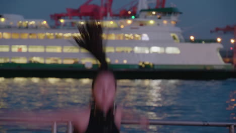 young, female, contemporary dancer on pier at night