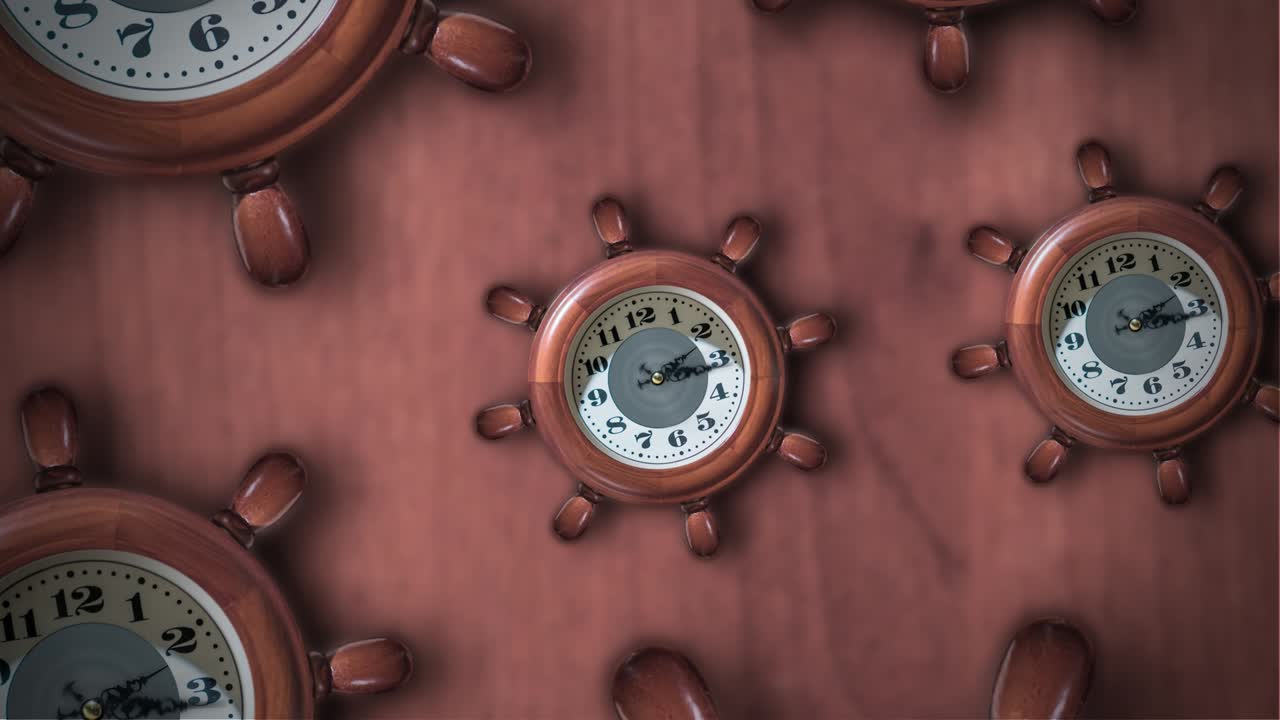 Many clocks in the shape of a ship's helm