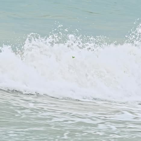sea waves crashing against the rocks