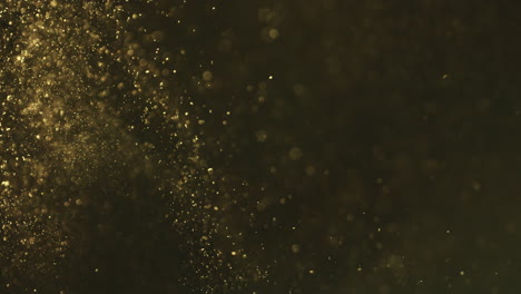 golden particles in motion