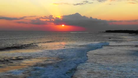 aerial sunset over canggu beach region in bali indonesia