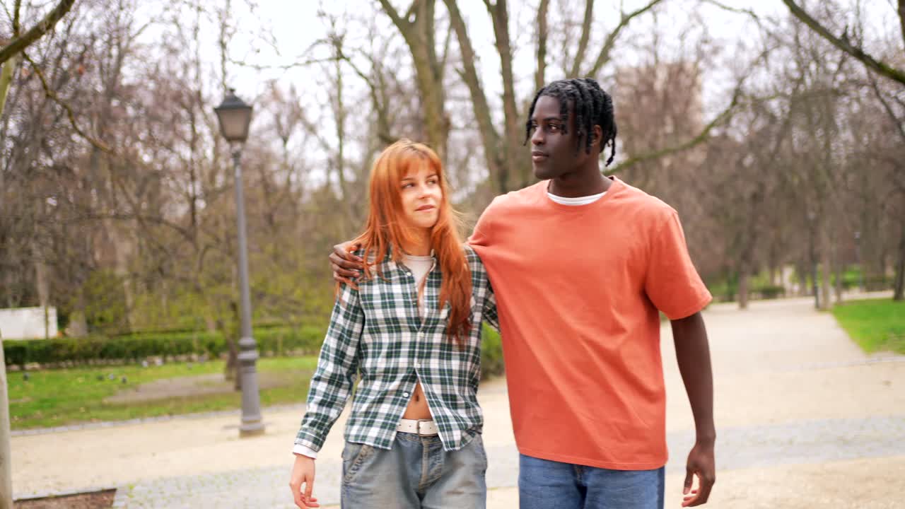 Young Couple Enjoying a Walk in the Park