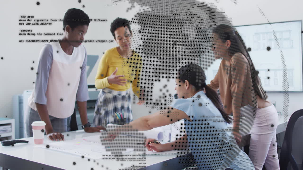 In office, diverse team collaborating on animation with digital world map overlay