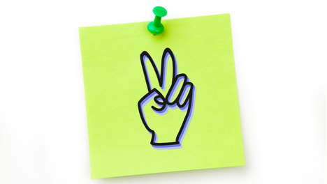 animation of a black hand icon flickering on green sheet of paper pinned on white background