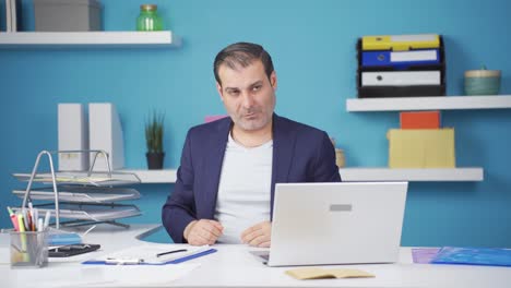 sick businessman sneezing.