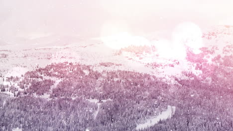 animación de puntos brillantes de luz sobre el paisaje de montaña de invierno