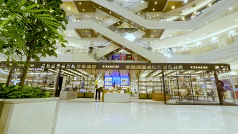 shopping mall time-lapse, big bright indoor department center store phnom penh cambodia