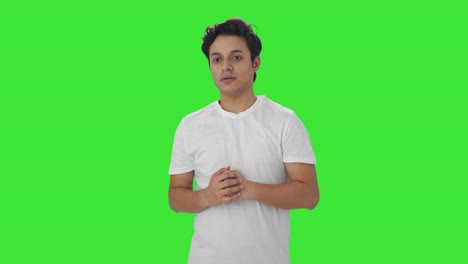 indian man scared of something green screen