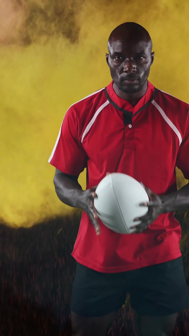 Jogador de rugby profissional segurando uma bola 4k
