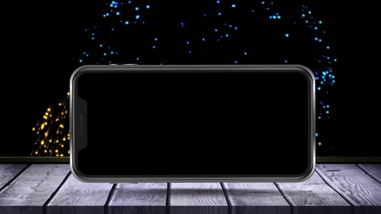 나무 표면 에 있는 빈 스마트폰 화면 의 애니메이션 과 배경 에 폭발 하는 불꽃놀이