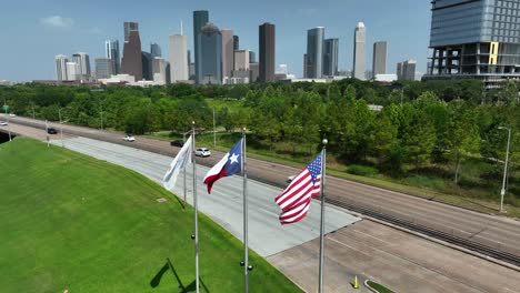 houston texas skyline with usa and tx state flag