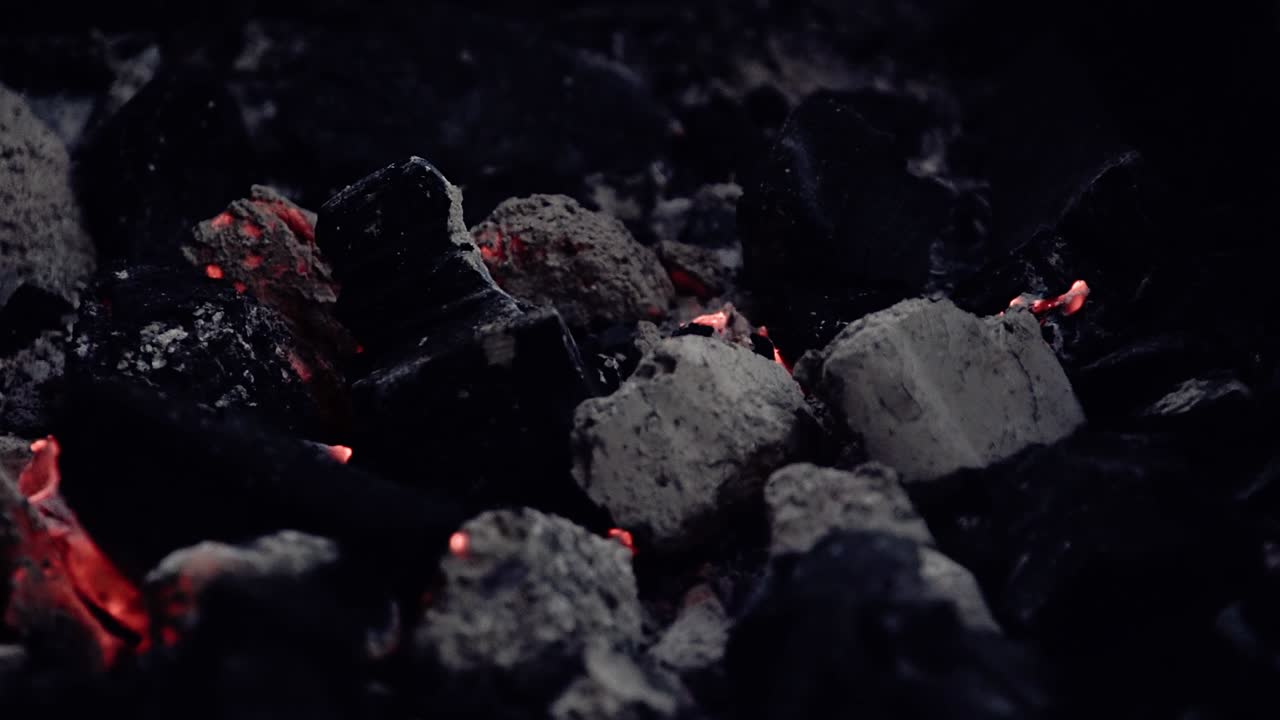 Smoldering coals in grill