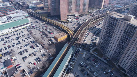 aerial view of modern train at west 8th street, near new york aquarium, brooklyn