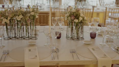 elegant wedding reception table setting with white flowers