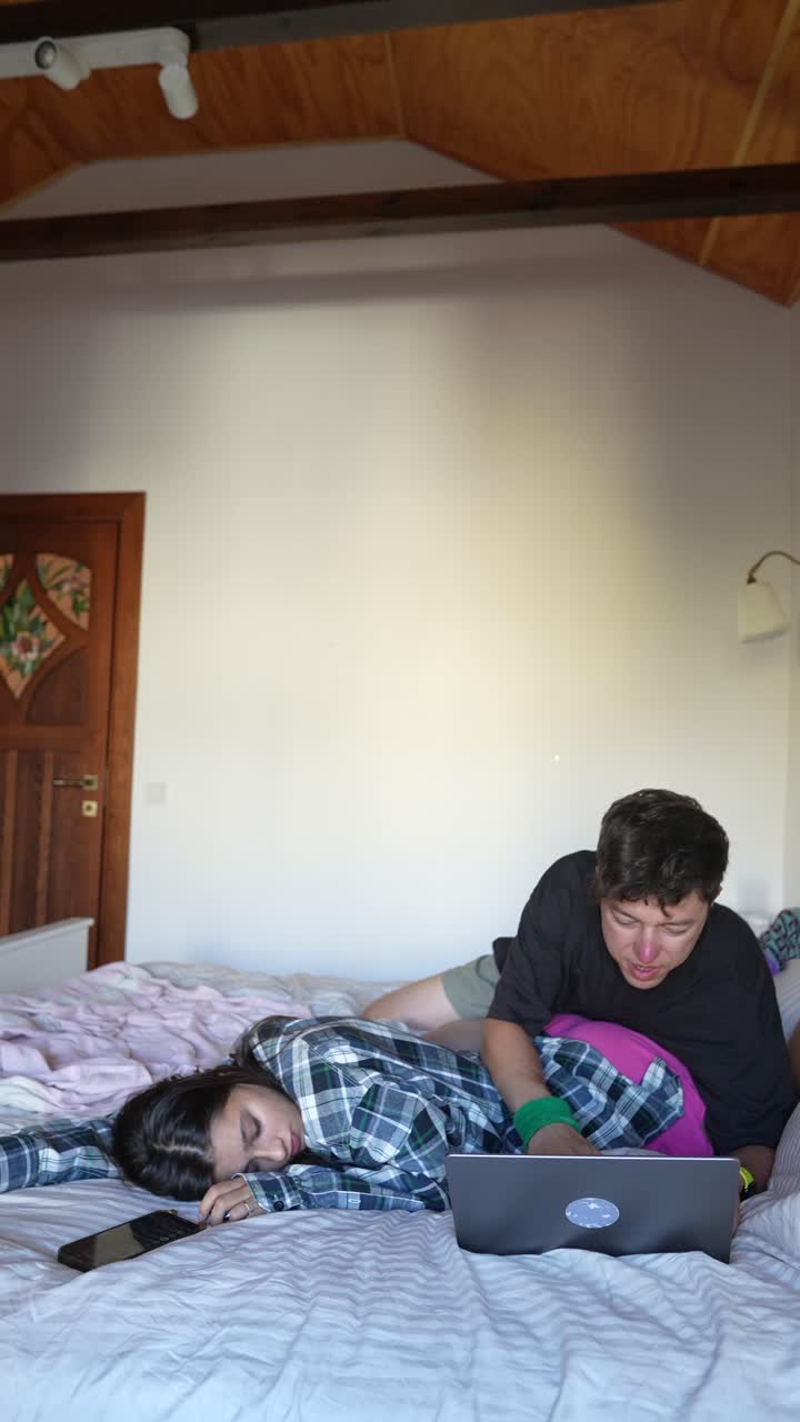 Couple Working/Sleeping in Bedroom