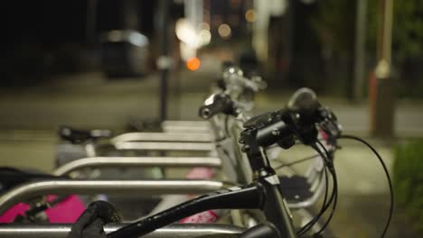bikes lined up in a tidy row, waiting for rental riders with places to go
