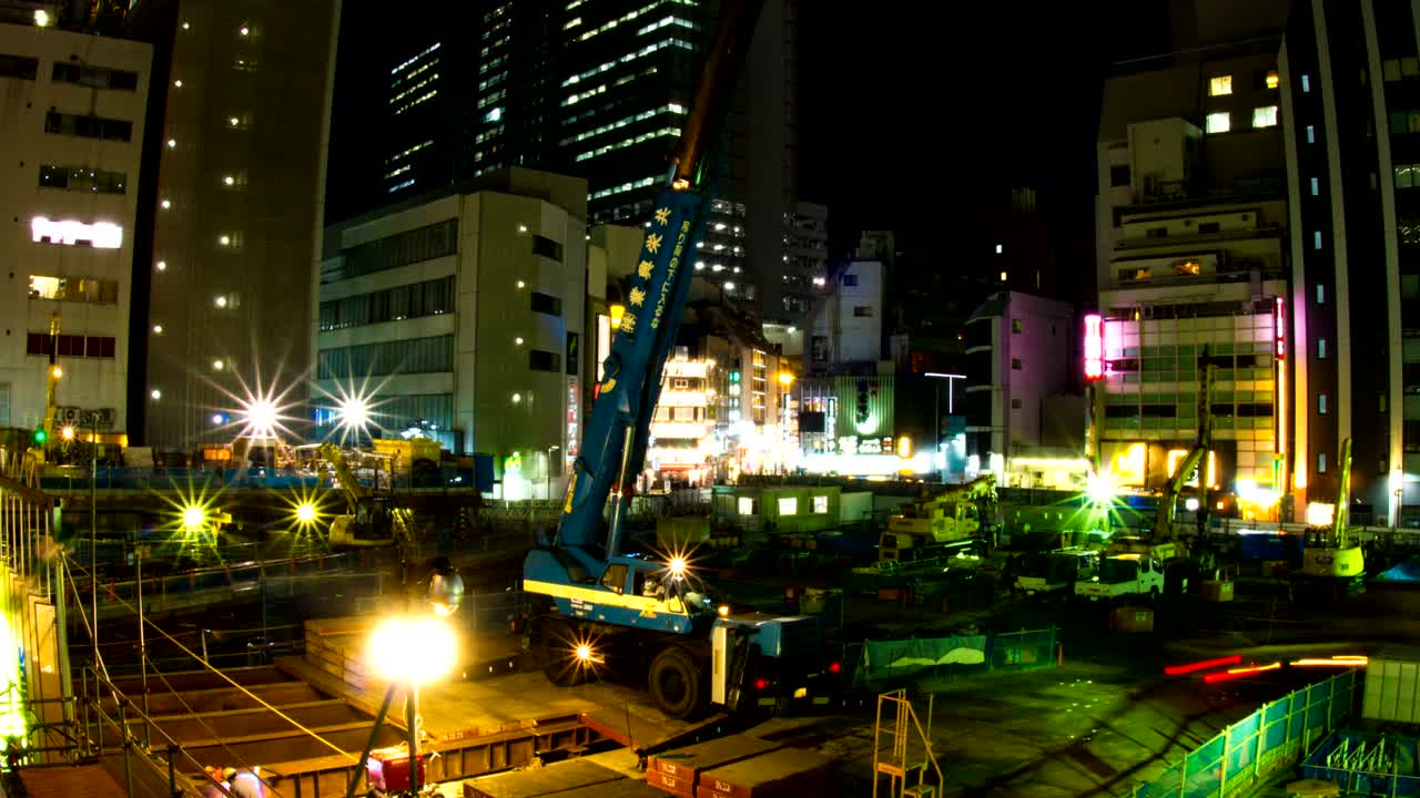 시부야에서 건설 중인 야간 러프 느린 셔터 확대