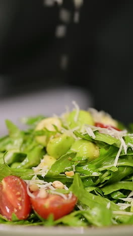 chef in kitchen cooking vegetables. table with healthy food in the kitchen