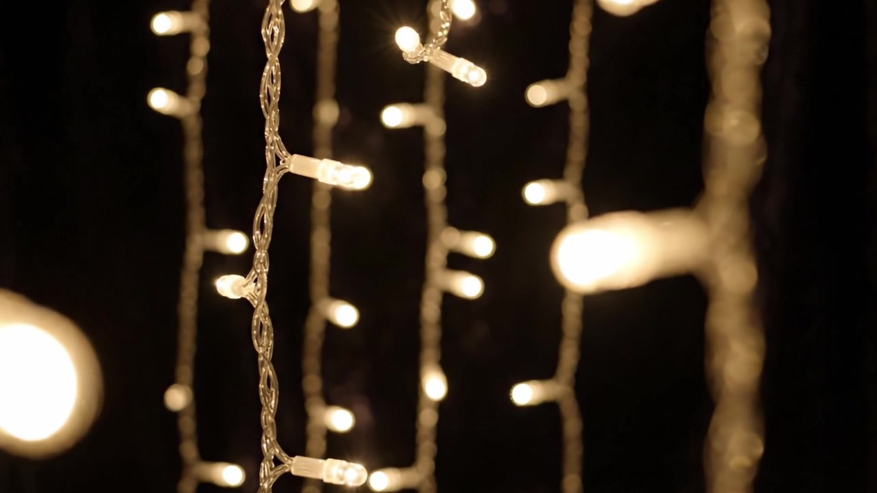 A Mesmerizing Display of Twinkling Fairy Lights Creating a Magical Atmosphere with Soft, Glowing Luminescence Against a Dark Background