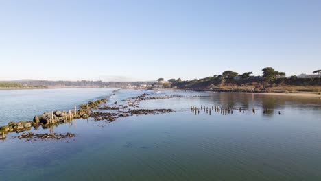 4k aerial drone shot overlooking water in bandon, oregon