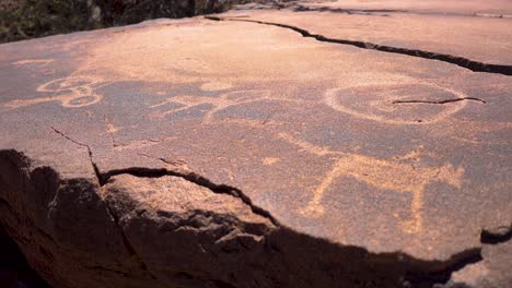 smooth shot of multiple rock paintings at twyfelfontein, nambia