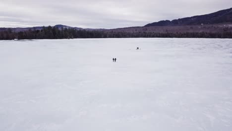 get an aerial view of ice fishing on fitzgerald pond, maine