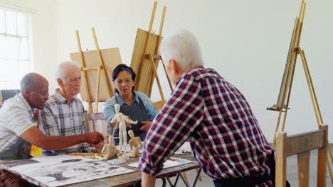 artists working together at table 4k