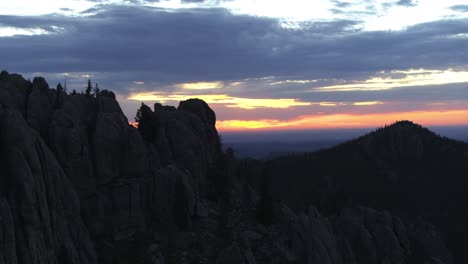 Drone-shot,-Cathedral-Spires-at-Custer-State-Park,-South-Dakota,-after-sunset