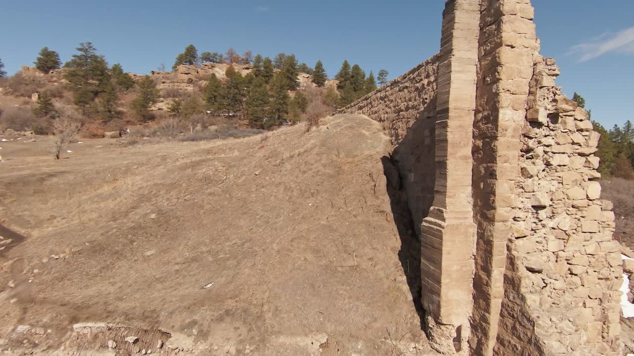 Rotation over old construction over river.
