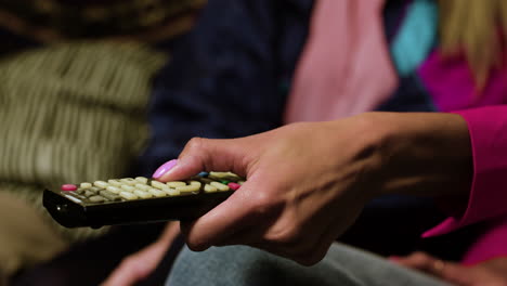 Woman-watching-TV-with-friends