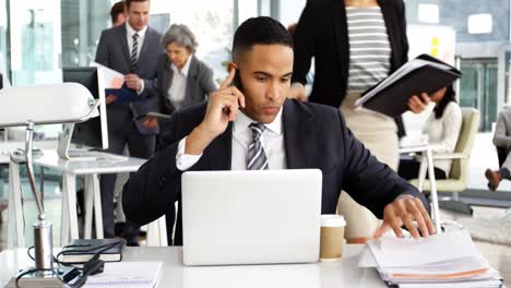 businesspeople giving work to businessman