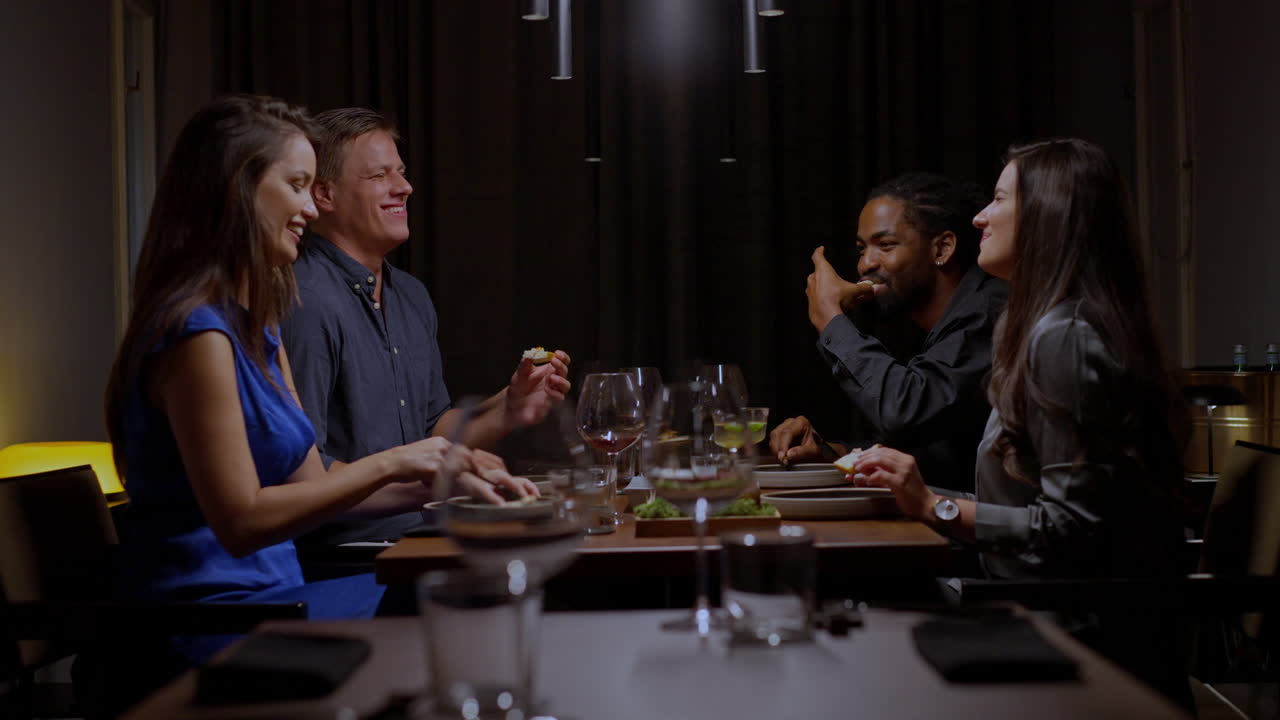Group of friends enjoying dinner at a restaurant