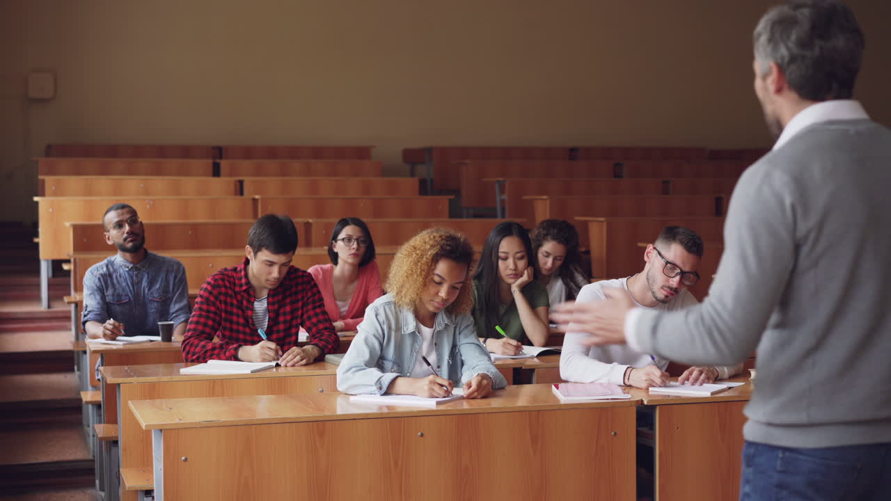 Students Attending a Lecture in a University Classroom