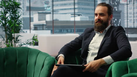 vertical video successful male entrepreneur reflecting about career and achievements