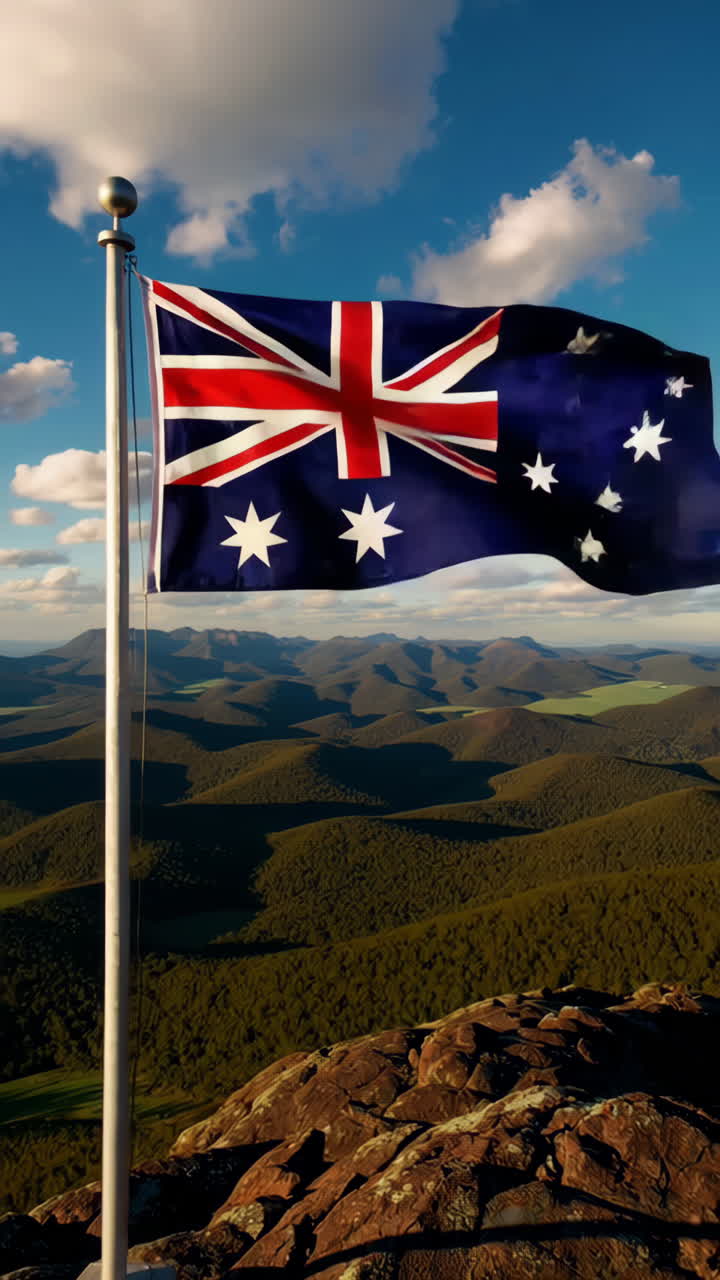 Australian Flag Flying High Over Scenic Mountains